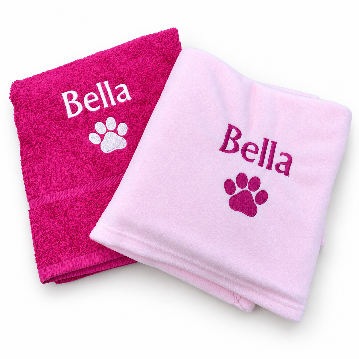 Bright pink towel and pale pink fleece blanket embroidered Bella